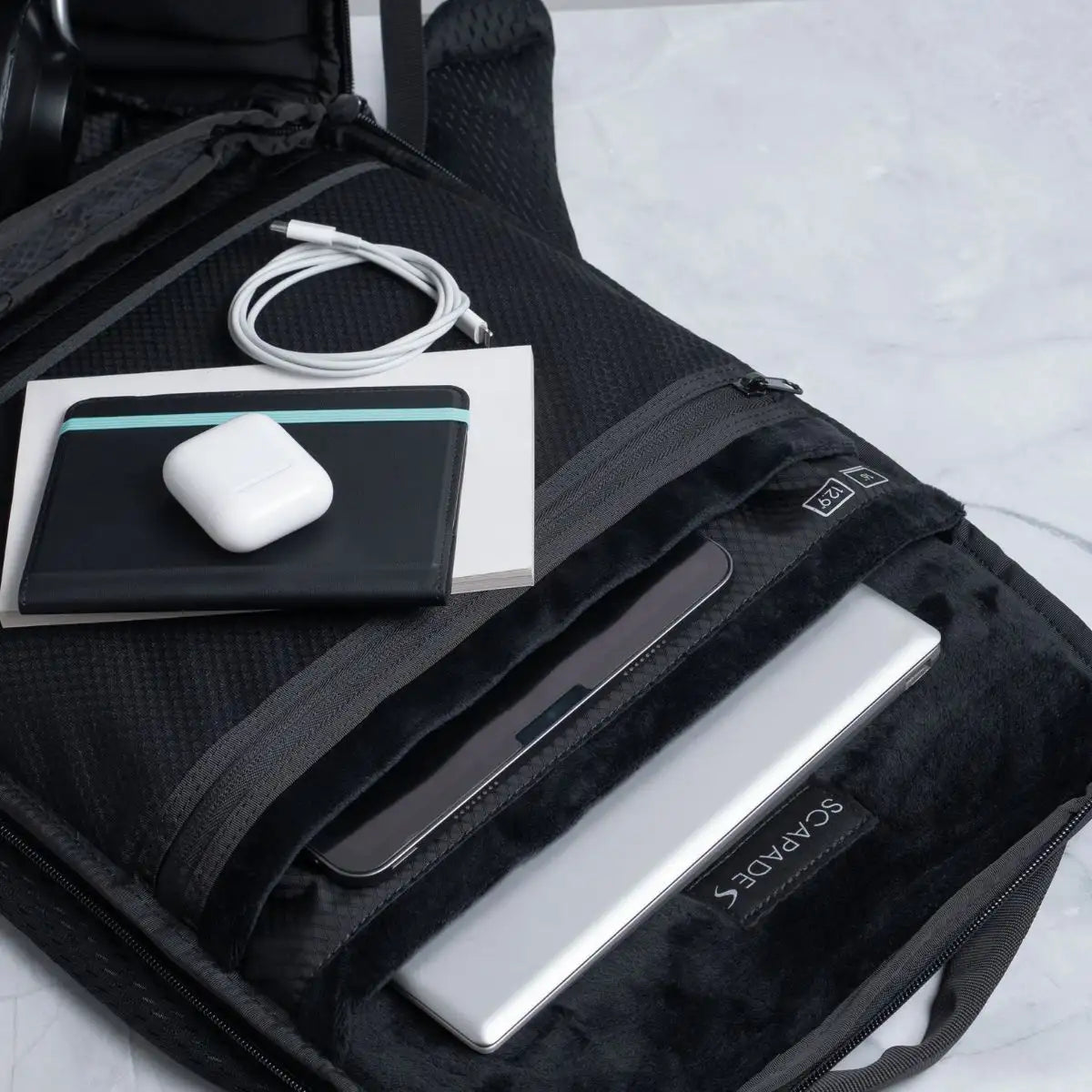 Scapade AirPack – Travel Backpack Compatible with Apple Find My & TSA Lock